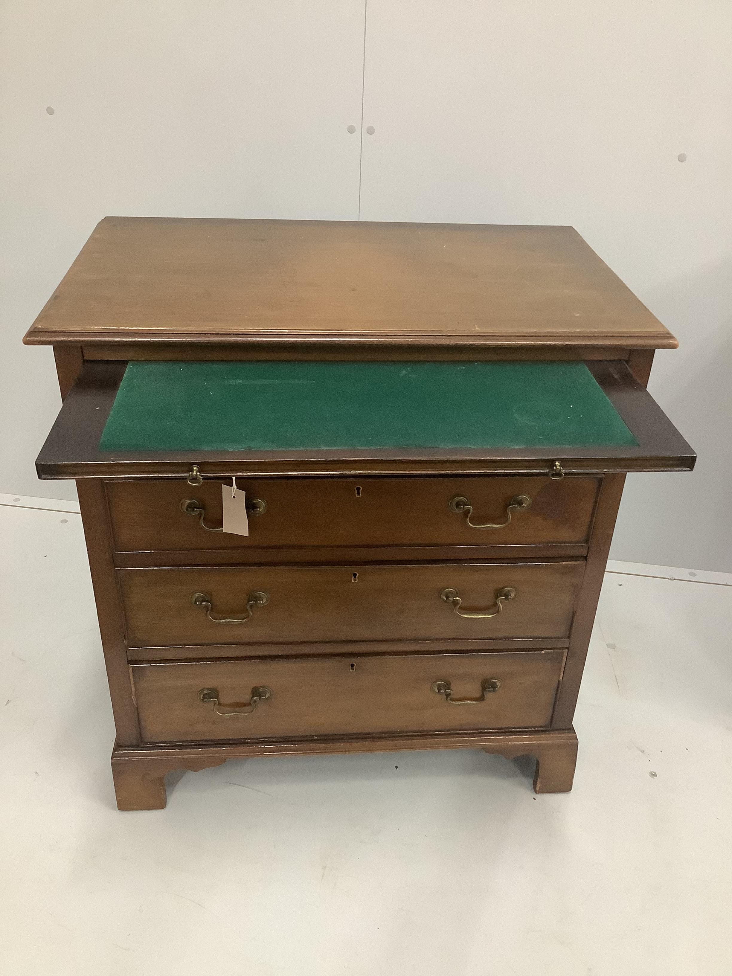 A small George III style mahogany chest with slide, width 76cm, depth 45cm, height 82cm.